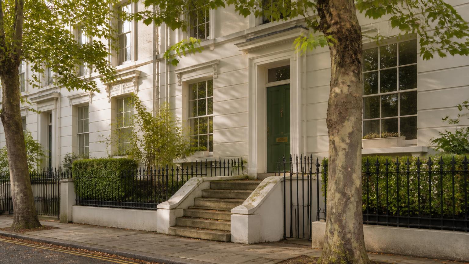 Period townhouse with tall sash windows and iron railings, typical of homes in Richmond